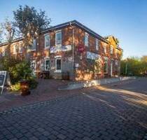 Geschäfts- und Wohnhaus in der „Pellwormer City“