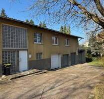 Großzügiges Einfamilienhaus mit schönem Garten und 4 Garagen, Eppelborn