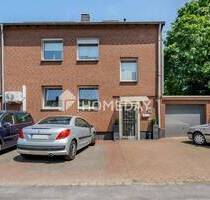 Vielseitiges Reihenendhaus mit Gartenidylle, drei Garagen und Potenzial für mehrere Generationen - Duisburg Ungelsheim