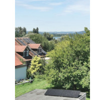 Stilvolle Dachgeschosswohnung mit Seeblick - Moos Iznang