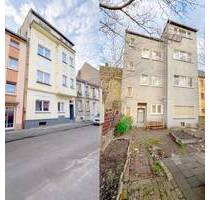 Ein Vierfamilienhaus mit stilvoller Fassade in einer Seitenstraße. - Duisburg Untermeiderich
