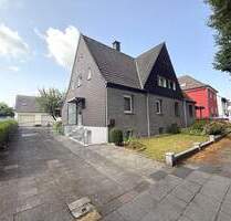 Doppelhaushälfte mit großem Garten und zwei Garagen in Recklinghausen- Hochlar