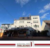 Attraktive Eigentumswohnung mit Dachterrasse und Garage in gepflegtem Wohn- und Geschäftshaus - Übach-Palenberg