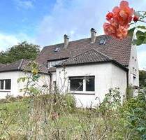 Ruhig und familienfreundlich wohnen: DHH mit großem Garten in Dortmund-Brackel (Sanierungsbedürftig) - Dortmund / Brackel