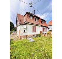 Kompakte Doppelhaushälfte zum Renovieren in Zeilsheim - Frankfurt am Main / Zeilsheim