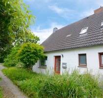 Ländliche Ruhe trifft Stadtflair - Reihenendhaus mit Garten in historischem Friedrichstadt