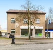 Zentral in Birkenwerder: Gut vermietetes, großzügiges Haus mit 2 Wohnungen, Gewerbefläche & Carport