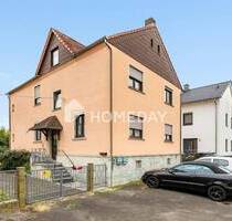 Charmantes Mehrfamilienhaus mit großzügigem Raumangebot und zwei Balkonen - Niederdotfelden