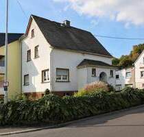 Vermietetes Einfamilienhaus mit praktischer Raumaufteilung und pflegeleichtem Garten in Pottum