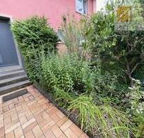 Erdgeschosswohnung mit Terrasse, Gartenanteil und Garage - Mainstockheim