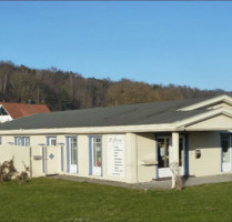 Attraktives Investment auf Rügen: 2 Ferienwohnungen und Geschäftslokal mit zusätzlichem Baugrundstück - Lietzow