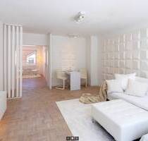 AIGNER - Lichtdurchflutete Penthousewohnung mit umlaufenden Balkon und Nähe zum Perlacher Forst - Unterhaching