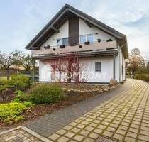Attraktives MFH in Grüneberg: 3 gut vermietete Wohnungen, 4 Stellplätze und großzügiges Grundstück - Löwenberger Land