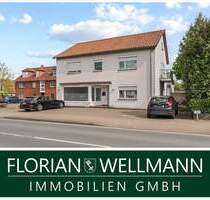 Achim | Vermietetes Wohn und Geschäftshaus mit freier Gewerbeeinheit und Baupotenzial im Hinterland