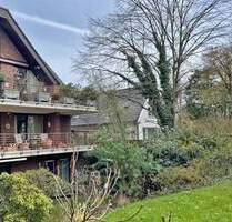 Immobilien-Richter: Elegante 3-Zimmer-Wohnung mit Traumgarten in Toplage von Düsseldorf-Ludenberg