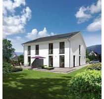 Das schlanke Town & Country Doppelhaus in Niederaula - urbanes Wohnen zweifach genießen