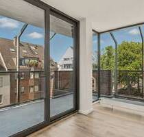 Exklusives Wohnen in Düsseldorf-Oberkassel - Sanierte 2-Zimmer-Wohnung mit Eckbalkon