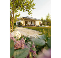 Der Bungalow mit der charmanten Form in Wutha-Farnroda - ausgefallen und praktisch