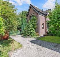 Gartenidylle trifft Gemütlichkeit - liebevoll gepflegte Doppelhaushälfte mit ansprechender Raumaufteilung in Bochum Wiemelhausen