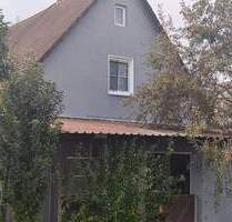 Sofort verfügbares Einfamilienhaus mit Garten, neuwertiger Heizung und Garage zu verkaufen. - Aiglsbach