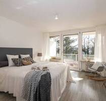 2-Zimmer-Wohnung mit großer Süd-Loggia und exklusiver Wellness Oase in ruhiger Lage - Unterschleißheim / Lohhof