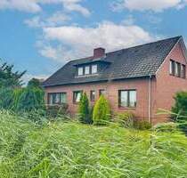 Gestaltbares Zuhause in Jork: EFH mit Südwest-Garten, Garagen und Sanierungsbedarf