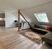 Dachgeschosswohnung mit Küche in St Sebastian - Urmitz