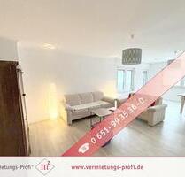 Trier-Heiligkreuz: Moderne, helle 2-Zimmer-Wohnung mit Balkon, Einbauküche und Stellplatz!