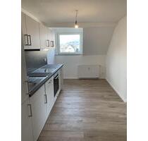 Moderne Dachgeschosswohnung in zentraler Lage von Frickhofen - Dornburg