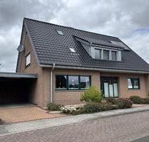Gepflegte Obergeschosswohnung mit Loggia und Carport in einem Zweifamilienhaus in Papenburg-Untenende