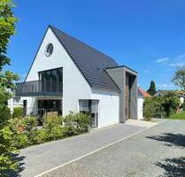 Sonnige Neubauwohnung mit eigenem Garten in Korbacher Bestlage