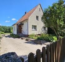 Ein Zweifamilienhaus mit Nebengebäude in Völksen - Springe