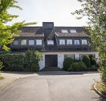 Traumhafte Maisonettewohnung mit Garten und Garage in Düsseldorf