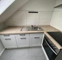 Helle Dachgeschosswohnung in Heddesheim mit Garage – Friedrichstraße 14