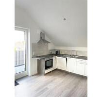 Hochwertige Neubau-Dachgeschosswohnung mit Balkon in zentraler Lage von Haselünne