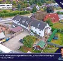 Moderne 3-Zimmer-Wohnung mit Einbauküche, Garten und Balkon in Syke-Barrien