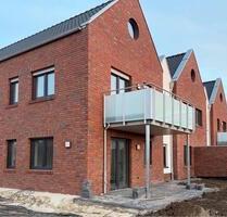 Moderne 2-Zimmer-EG-Wohnung - Erstbezug, hochwertige EBK, Garten - Twistringen