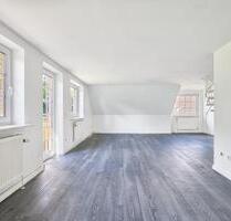 Großzügige 4-Zimmer-Wohnung mit Balkon & ausgebautem Dachboden - Jörl