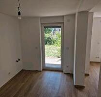 Helle Souterrainwohnung mit Terrasse und Zugang zum Garten - Künzell