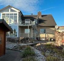 Helle Erdgeschosswohnung mit Terrasse und Wintergarten - Hüllhorst