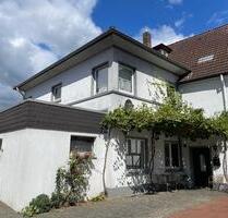 Wohn- und Geschäftshaus mit Balkon, Gartenblick - Melle