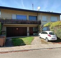 Einfamilienhaus mit Einliegerwohnung - Helmstadt-Bargen