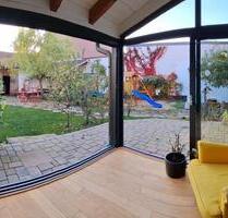 Idyllisches Einfamilienhaus mit Südgarten & möglichem Bauplatz - Neulußheim