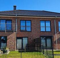 Brunsbüttel-Zentrum: Sonnige, große EG-Neubauwohnung mit Garten!