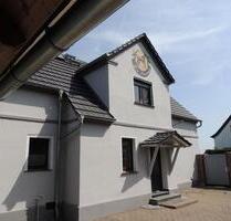 Einfamilienhaus mit Garage, Nebengebäude u. Garten in Hoyerswerda