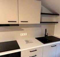 Erstbezug: Moderne, zentrale OG-Wohnung mit neuer EBK - Barßel