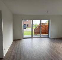 3-Zimmer-Neubauwohnung m. Terasse, Garten und Stellplatz in Haste