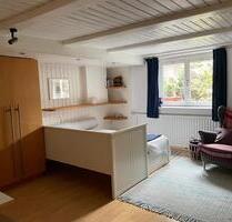 1 Zimmer Souterrainwohnung für weibliche Person in Oberhaching