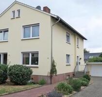 Moderne 3-Zimmer-Wohnung mit hochwertiger Küche und Garten - Lübbecke