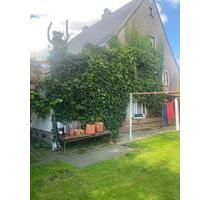 Einfamilienhaus mit Balkon, 2 Garagen - Drebach